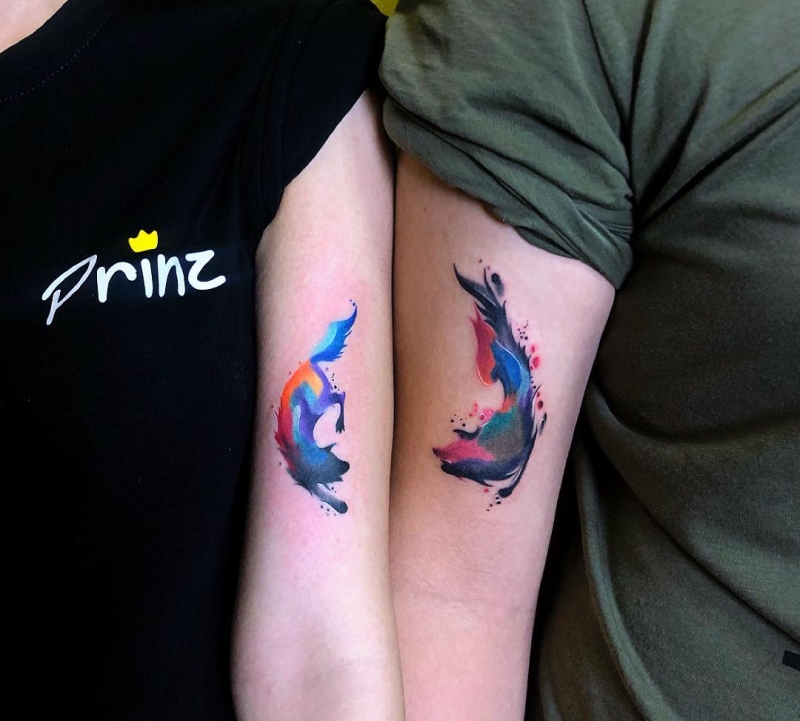 watercolor wolves tattoo 