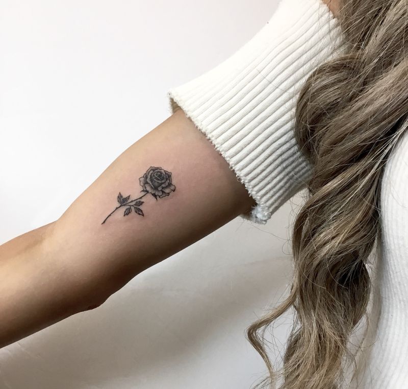 minimalist rose tattoo design