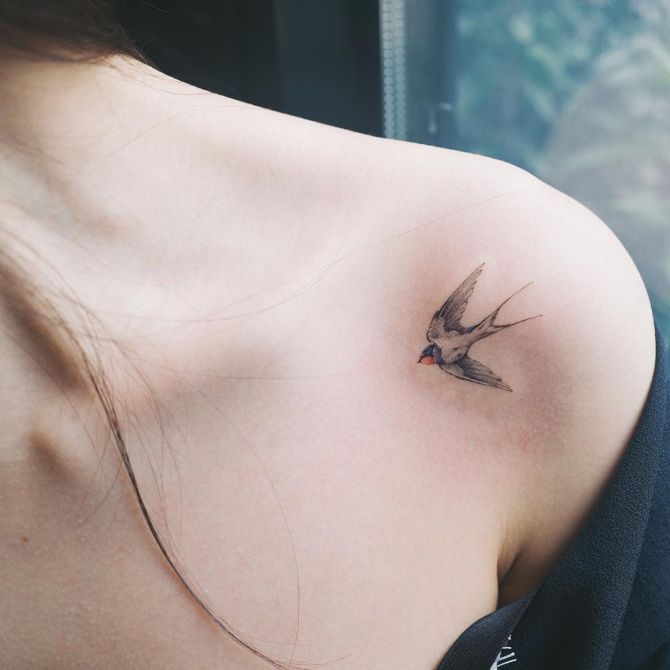 minimalist bird tattoo