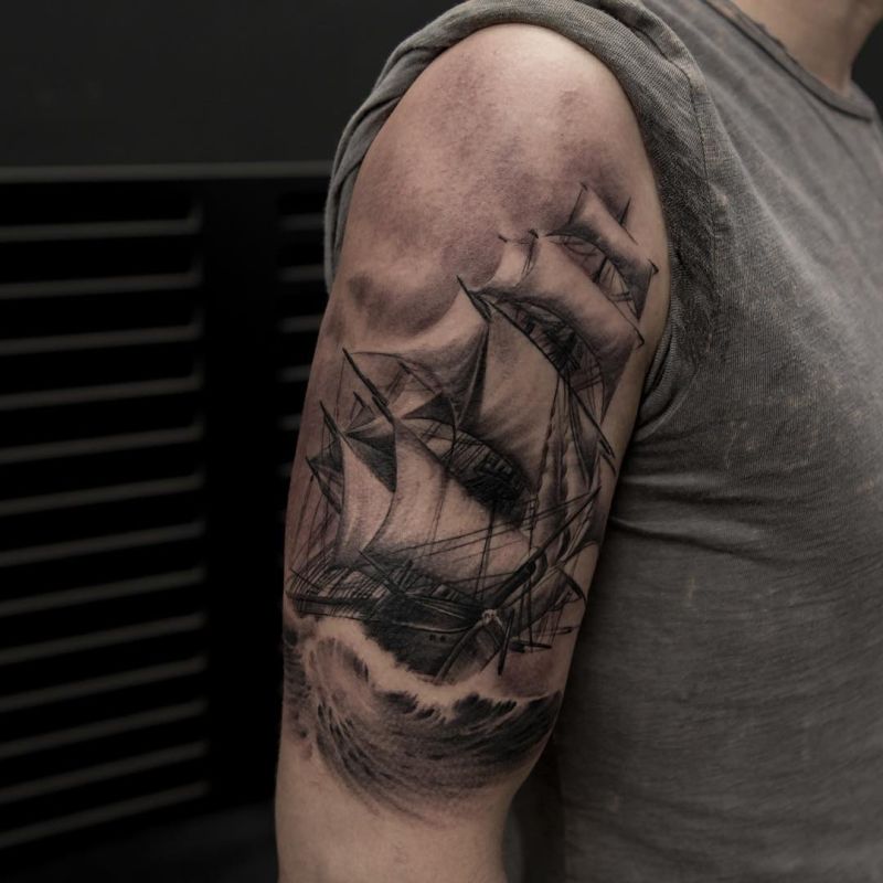 black and gray ship tatoo