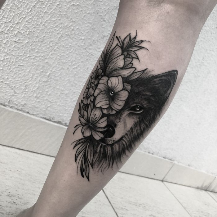 Wolf in some flowers by me Katie at Rock N Roll Tattoo on Glenwood in  Raleigh Nc  rtattoo