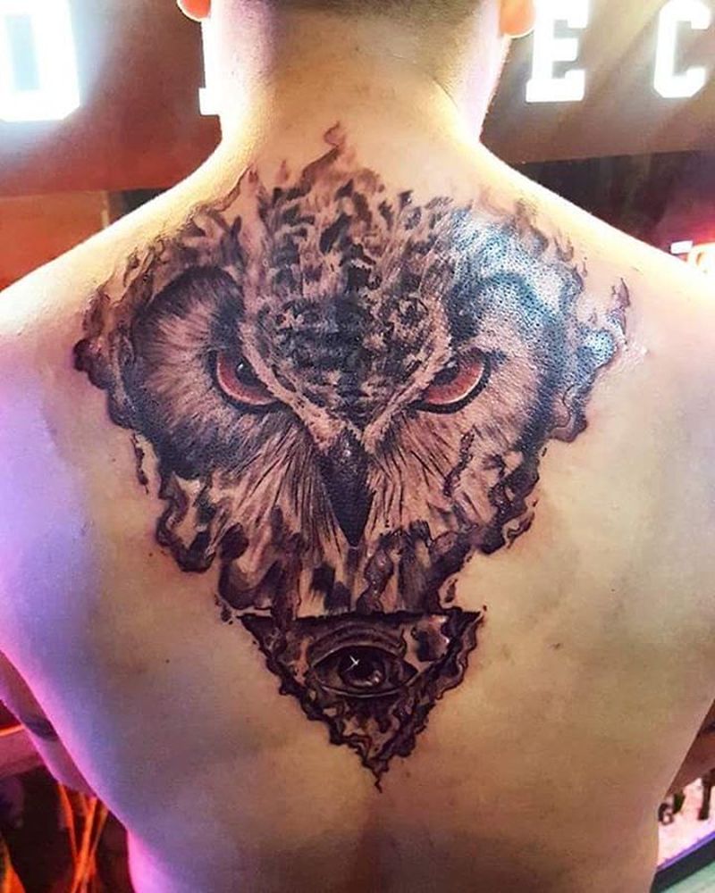 Chest tattoo of an owl by Matt Driscoll: TattooNOW