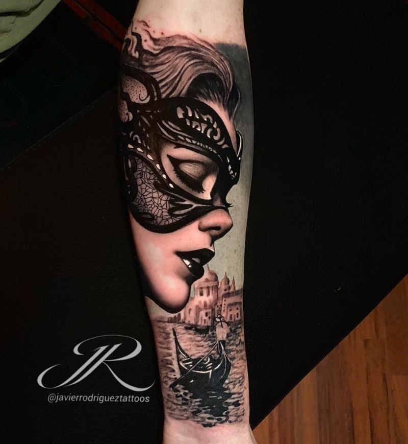 Microrealistic Venetian mask tattoo on the inner