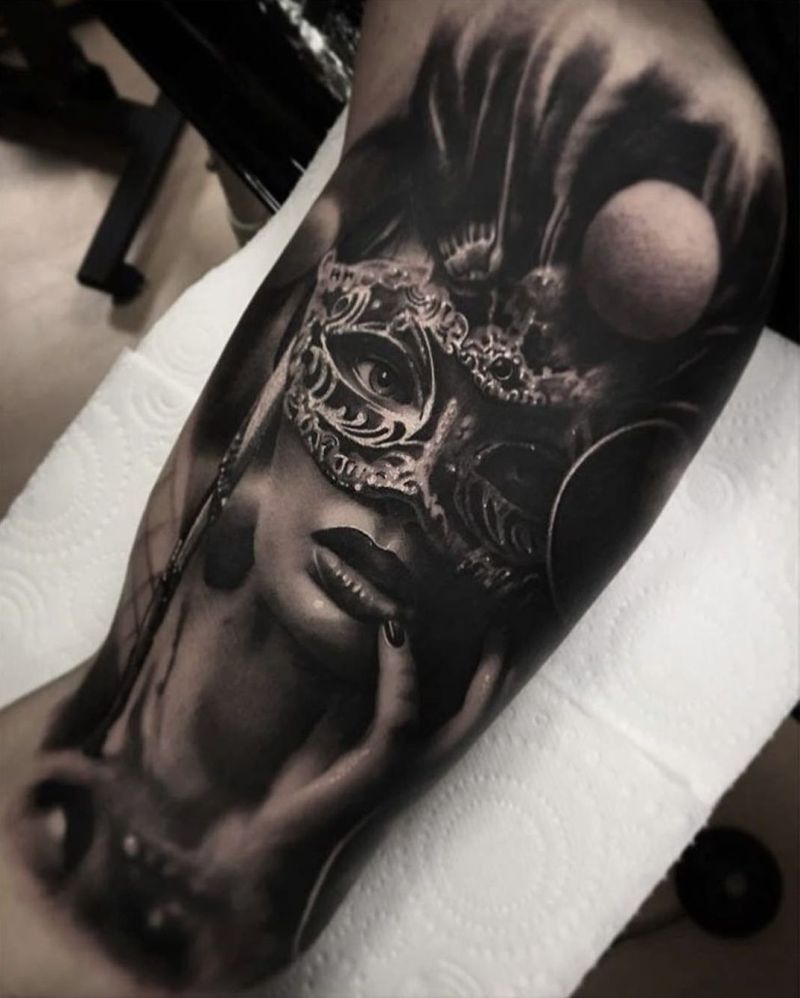 black & gray Venetian mask tattoo