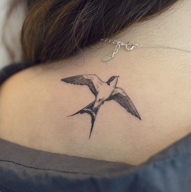 One line hummingbird tattoo located on the inner