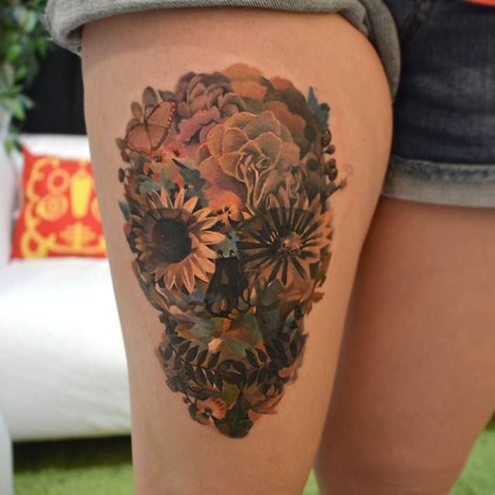 floral skull tattoo