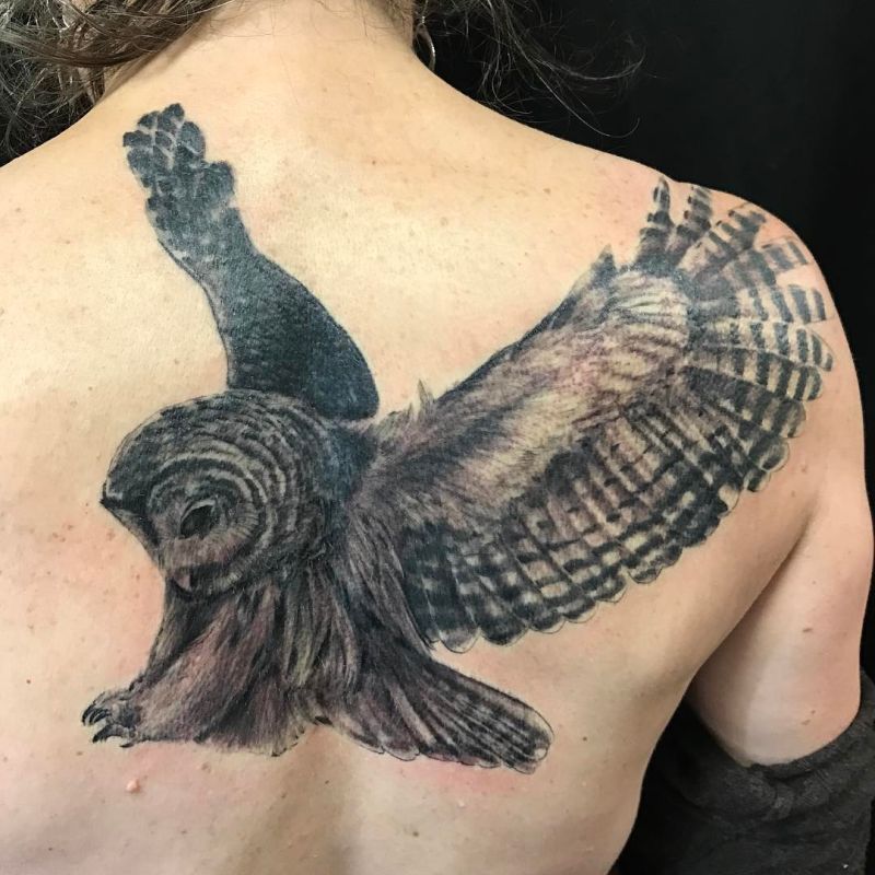 pretty flying owl tattoo