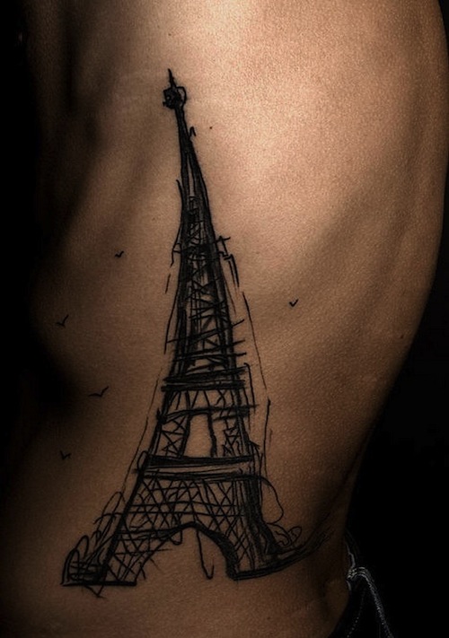 Fine line Eiffel Tower tattoo on the wrist
