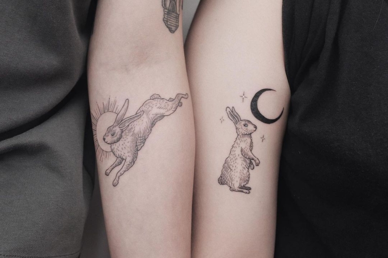 couple sun and moon tattoos