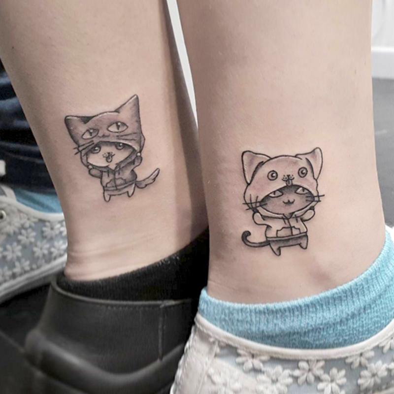 cat couple tattoo