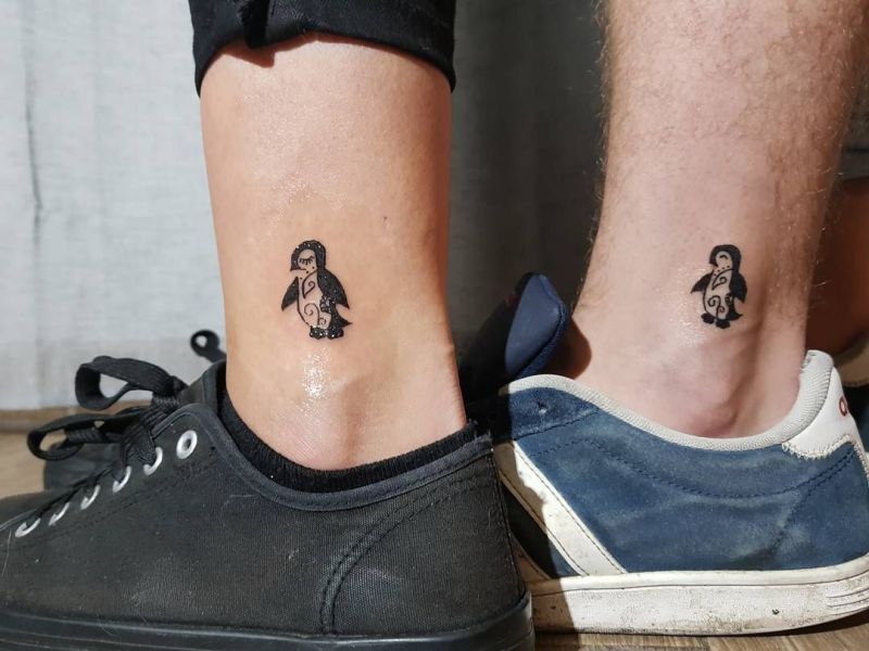 matching penguin tattoo designs