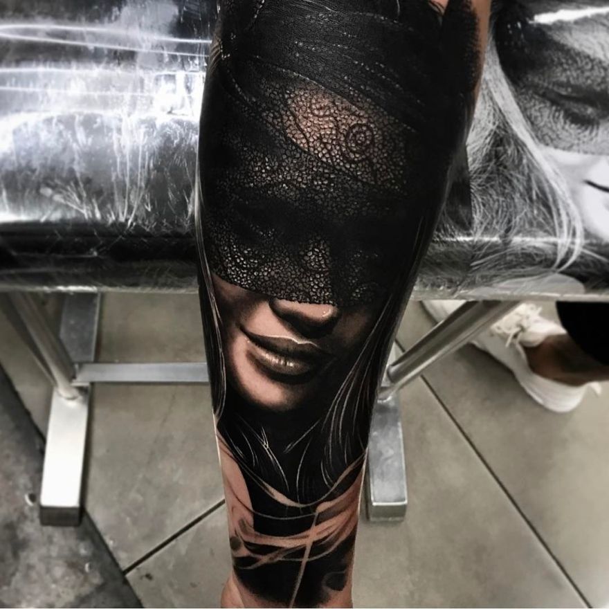 black and grey realistic tattoo