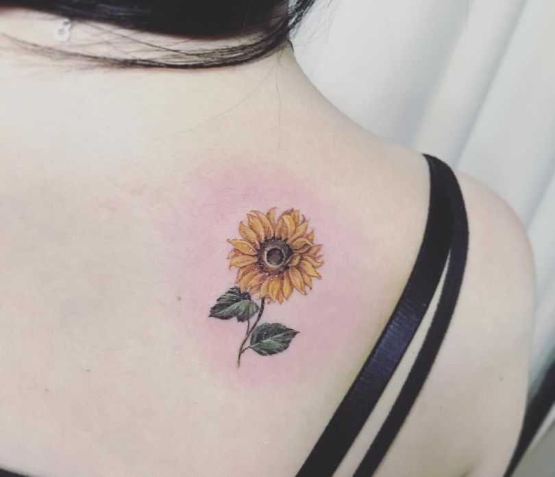 sunflower tattoo on back