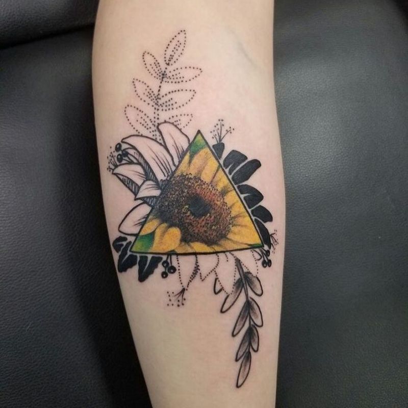 Tattoo uploaded by Benjamin  Geometric triangle sunflower design on inner  forearm in black realism  Tattoodo