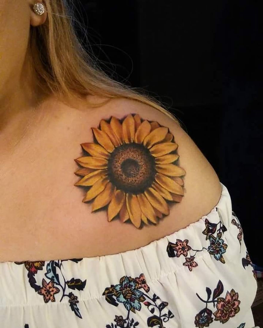Microrealistic sunflower tattoo