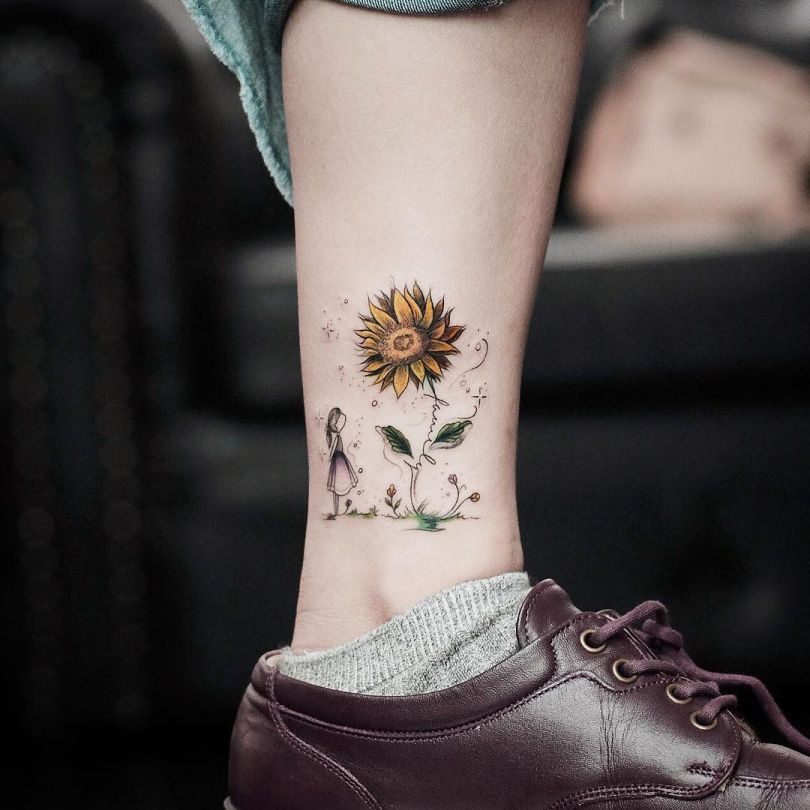 sunflower tattoo on leg