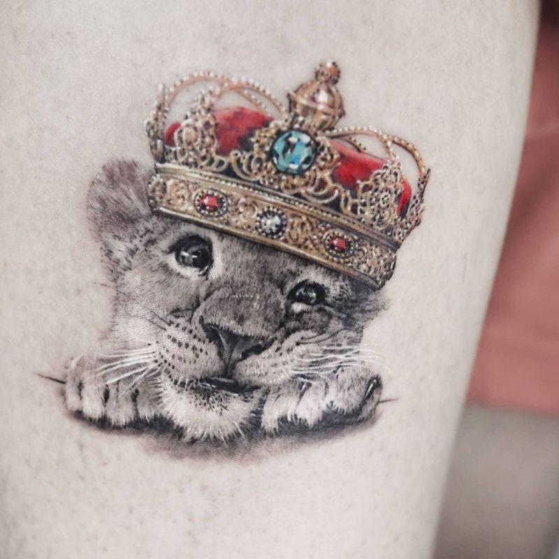 super cute lion cub tattoo