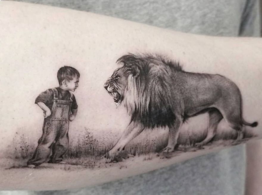 black and white lion tattoo