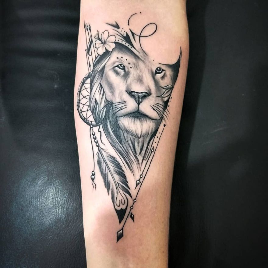 feminine lioness tattoo