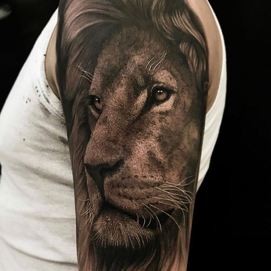 Microrealistic lion portrait tattoo on the inner