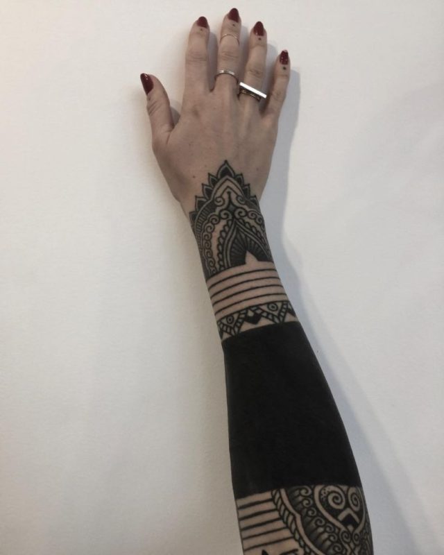 These Striking Solid Black Tattoos Will Make You Want To Go All In ...