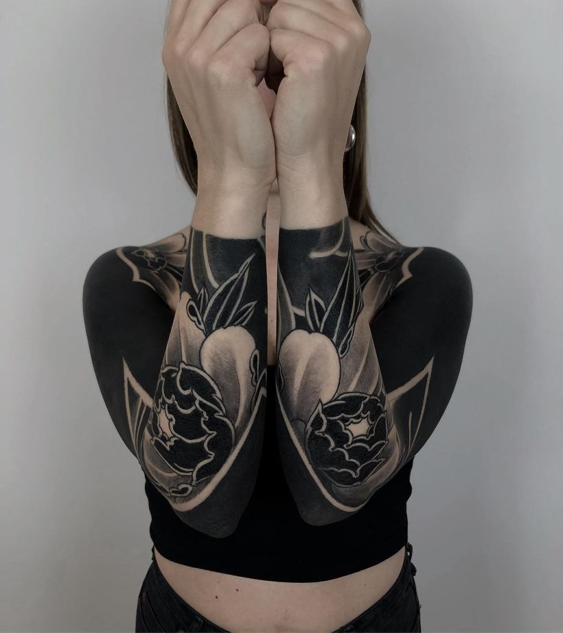 These Striking Solid Black Tattoos Will Make You Want To Go All In