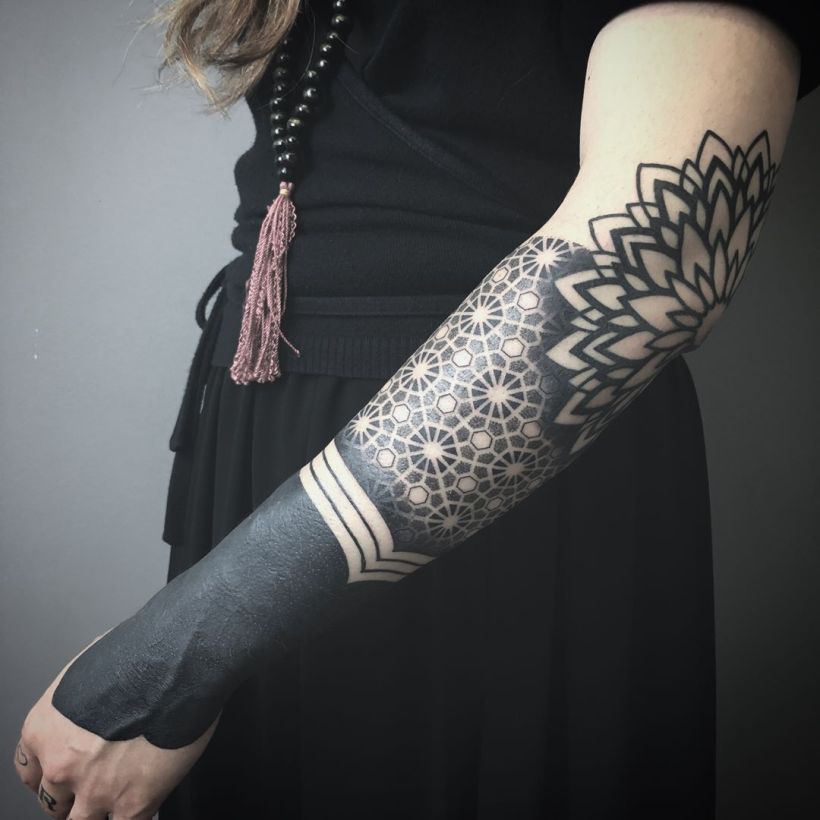 Half Sleeve Negative Space Blackout Tattoo