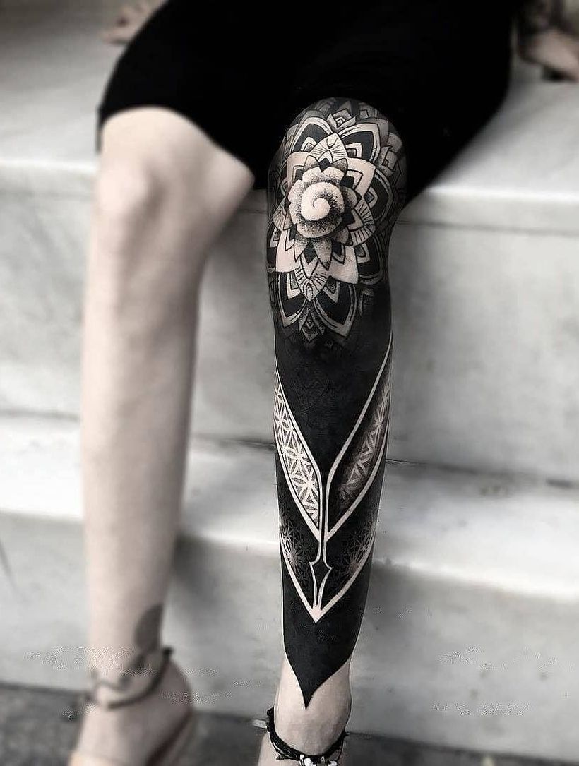 These Striking Solid Black Tattoos Will Make You Want To Go All In