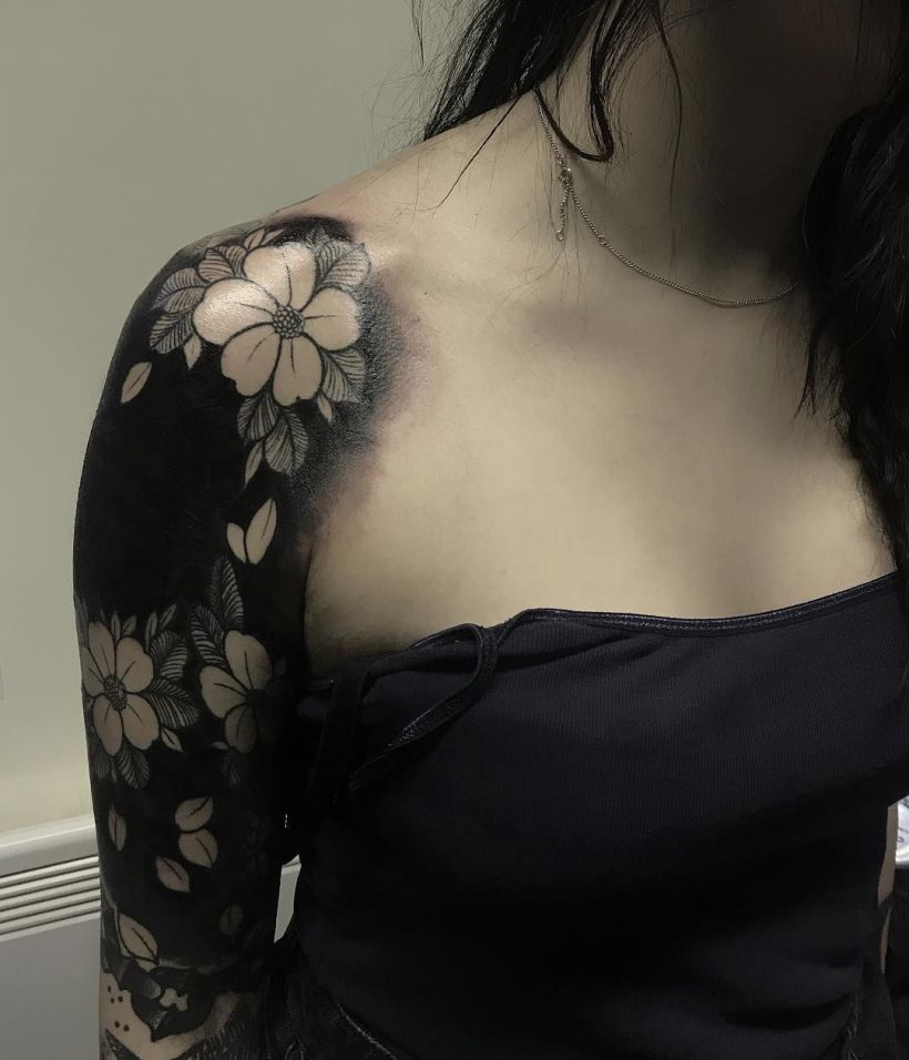 These Striking Solid Black Tattoos Will Make You Want To Go All In