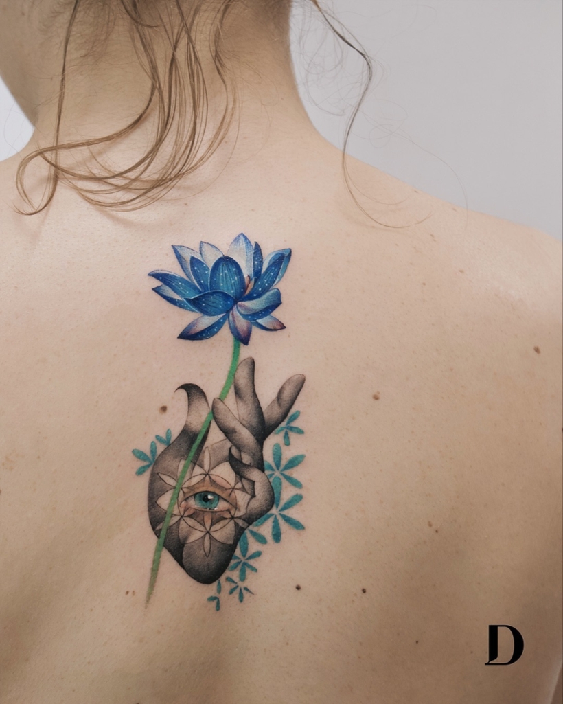 BACK LOTUS TATTOO DESIGNS | Tattoo designs, Lotus tattoo design, Tattoos