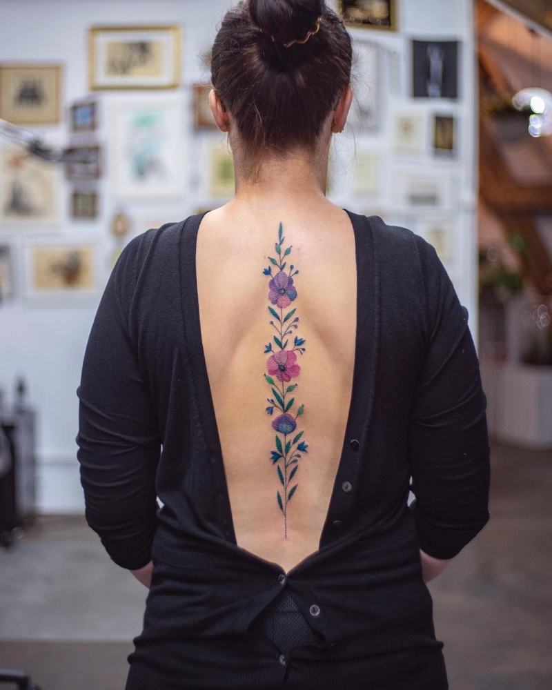 floral spine tattoo