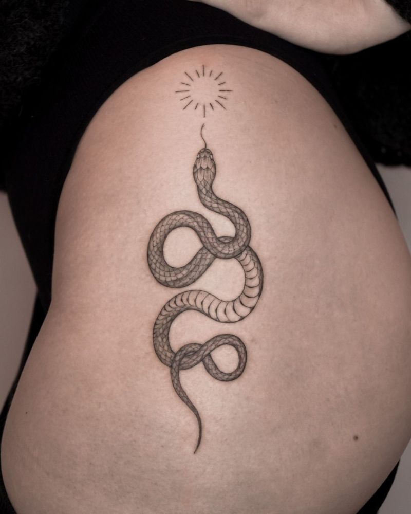 hip snake tattoo for girls