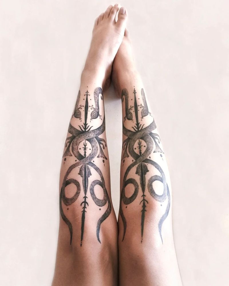snake tattoo on legs