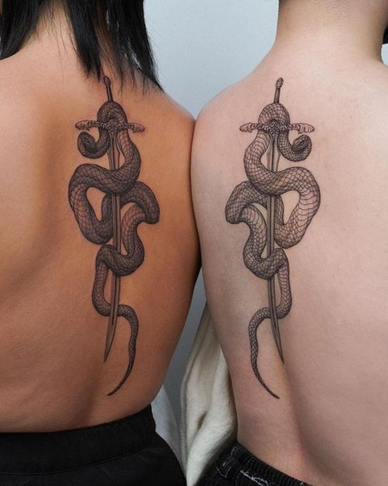 matching snake tattoos