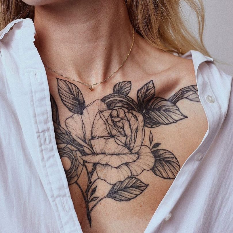awesome flower tattoo on chest